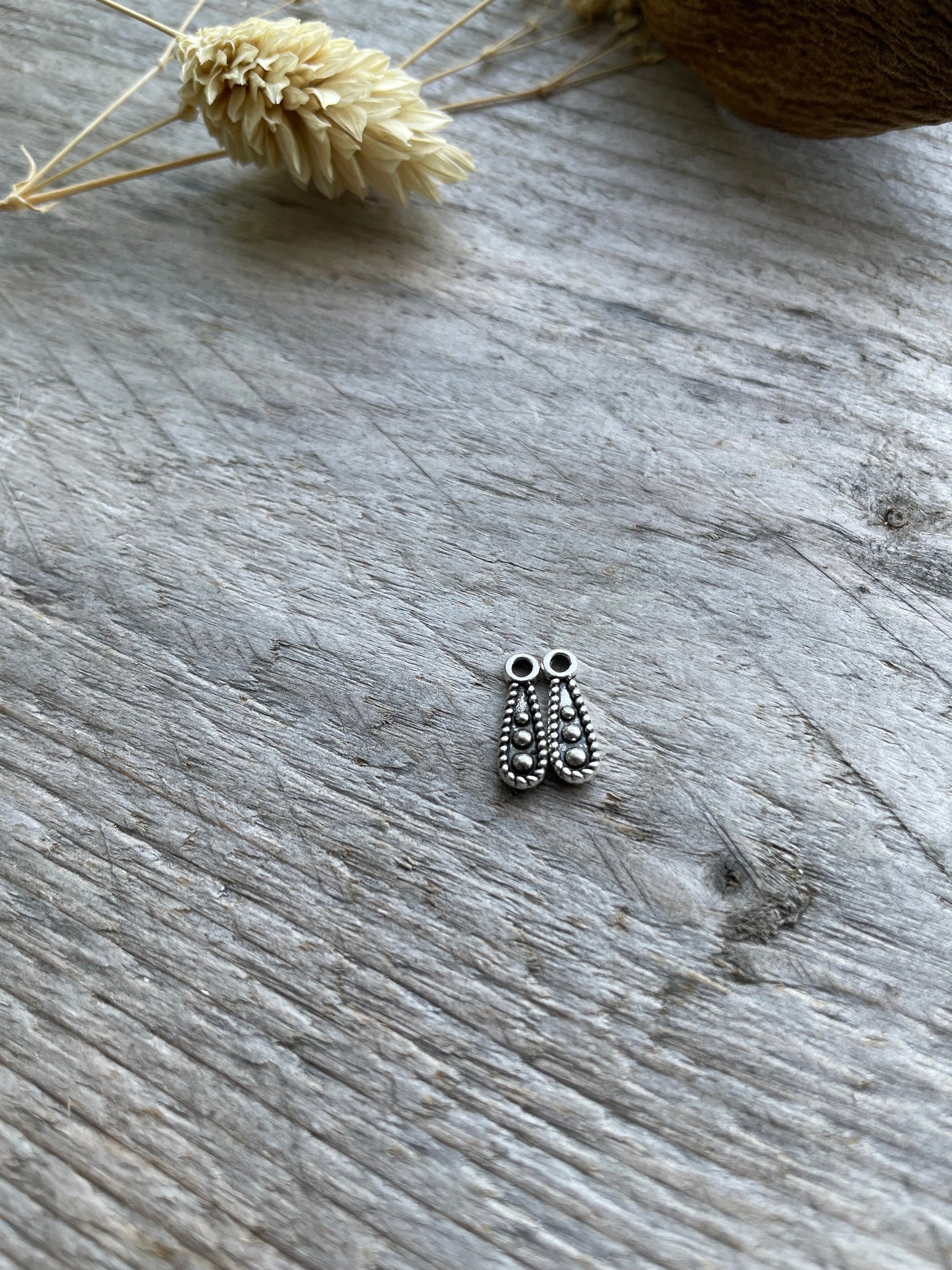 Teardrop tibetan charm dark silver 4 x 12mm