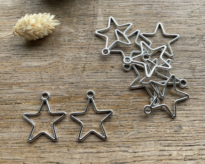 Star open bezel charms/pendants