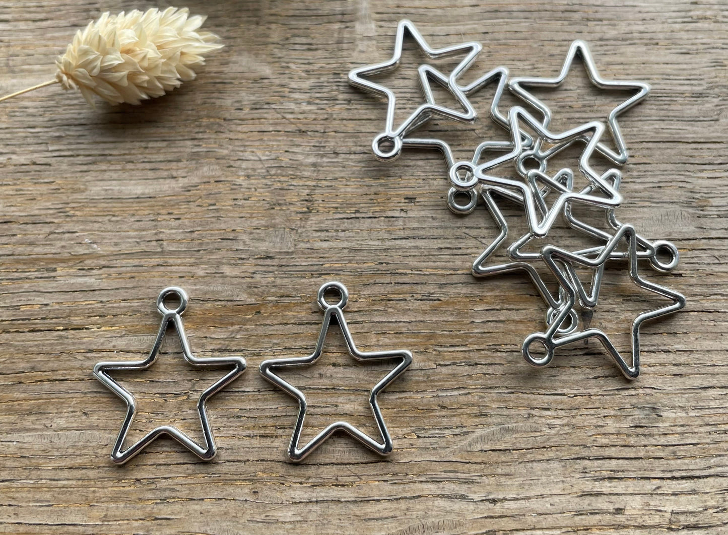 Star open bezel charms/pendants