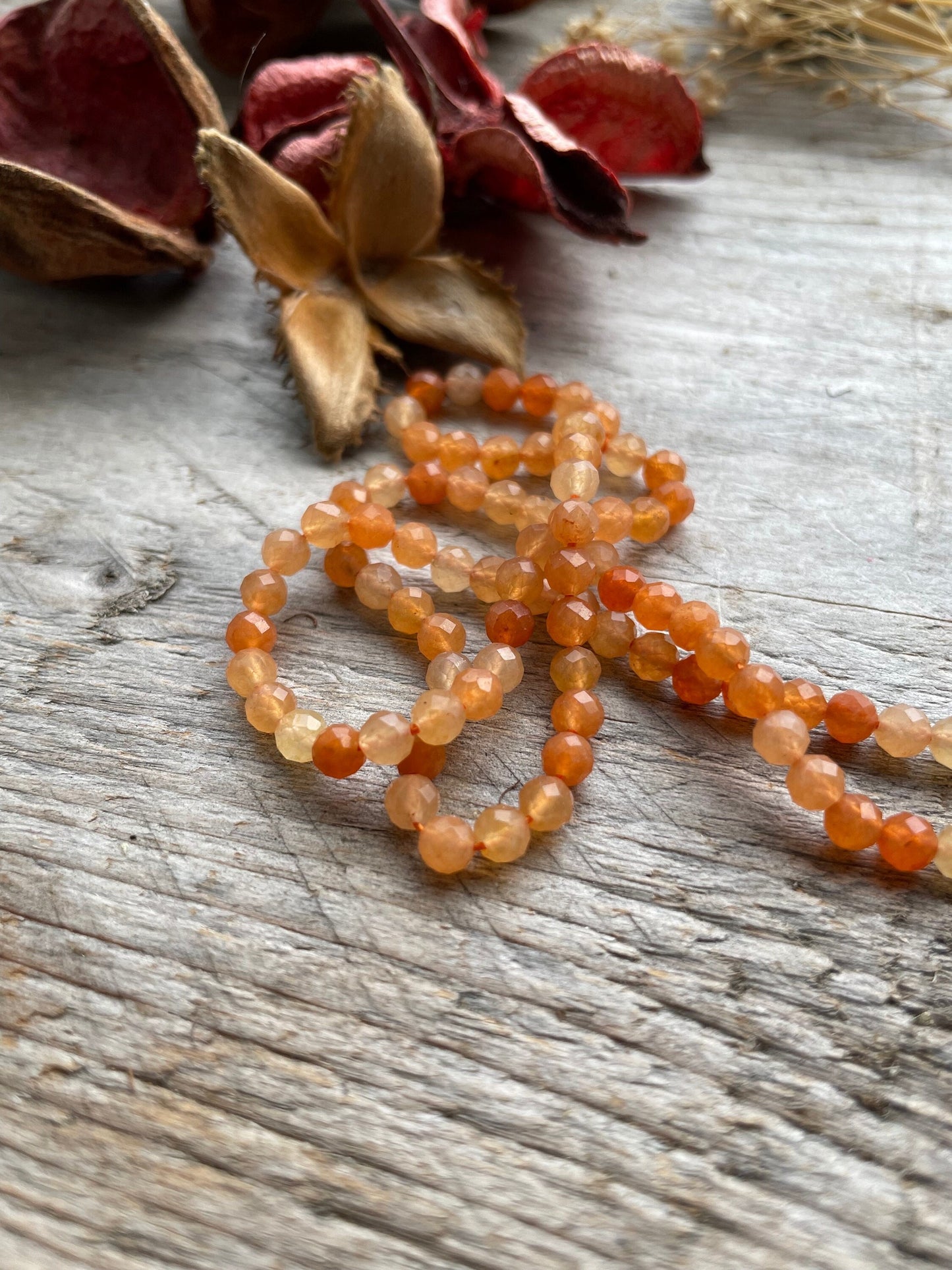 Red adventurine faceted 4mm beads