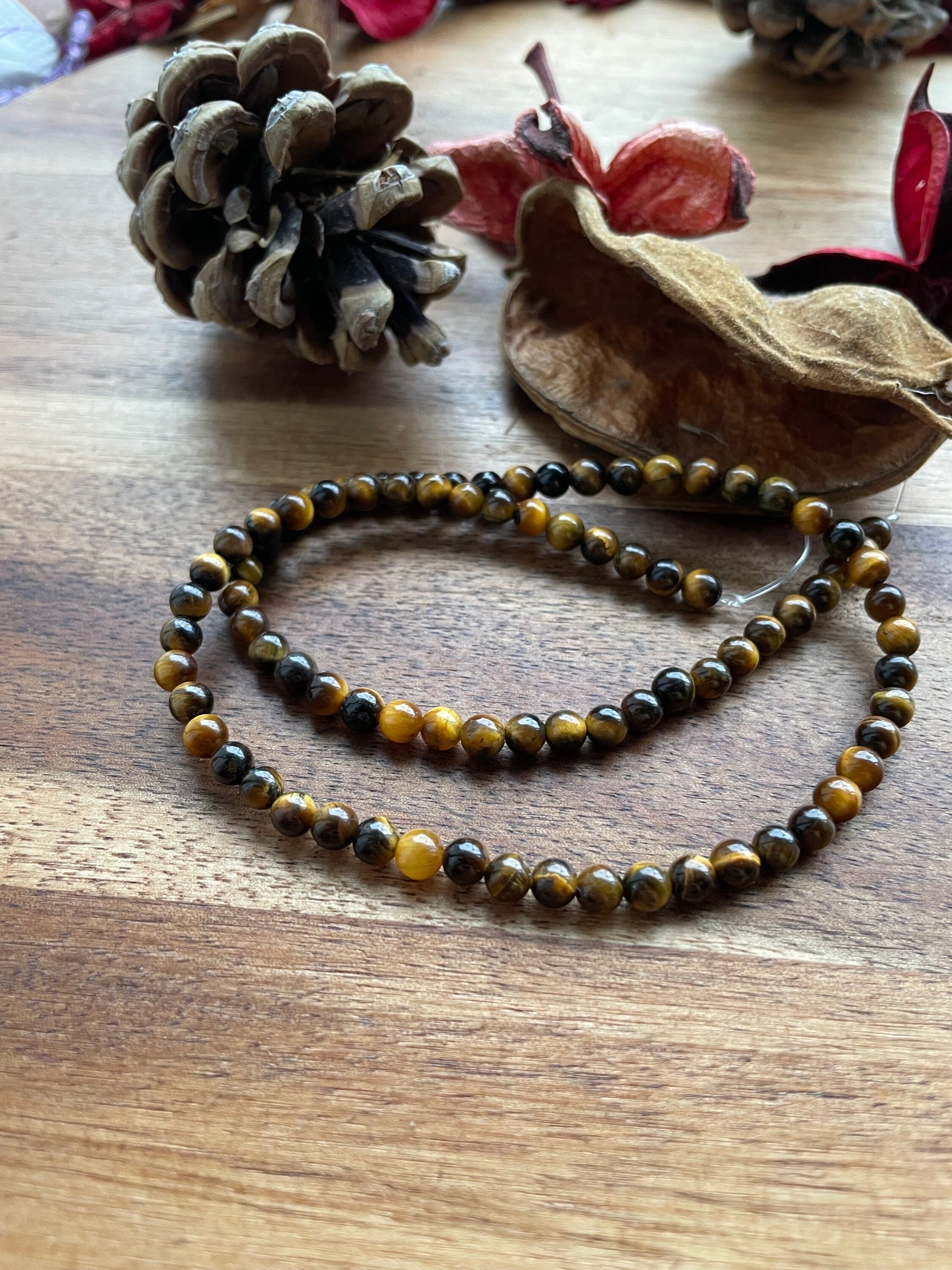 Tigers eye 4mm round bead