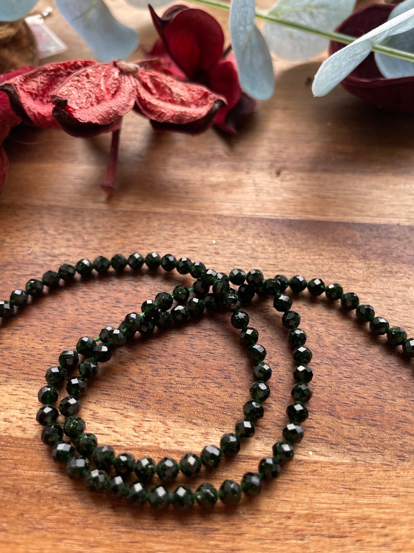 green goldstone faceted 4mm